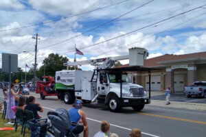 The Family Tree bucket truck in a parade